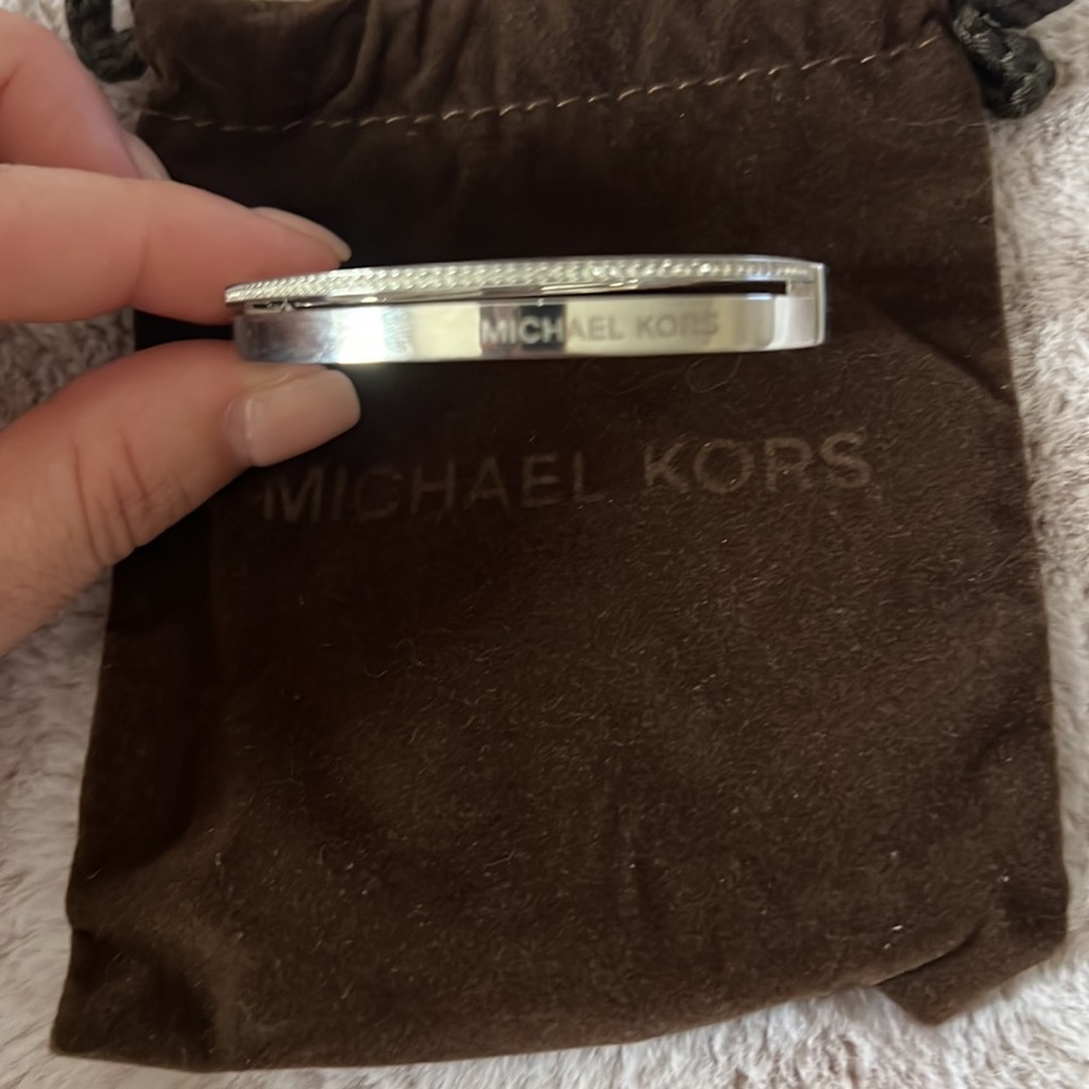 Michael Kors clasp bangle. Worn a handful of times. Original dust bag included.